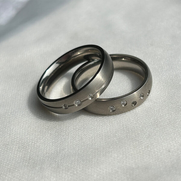 domed stone set titanium rings with thin grooves