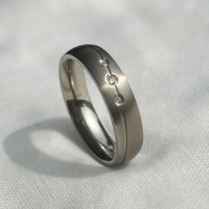 titanium mens engagement ring with triple stones