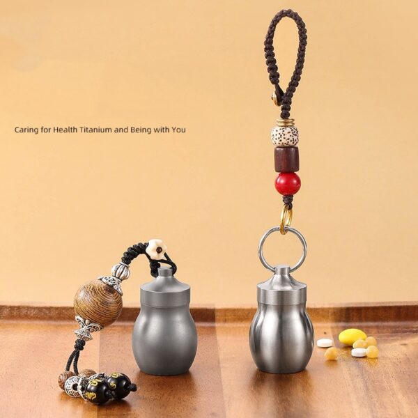 titanium waterproof pill capsule with hand strap